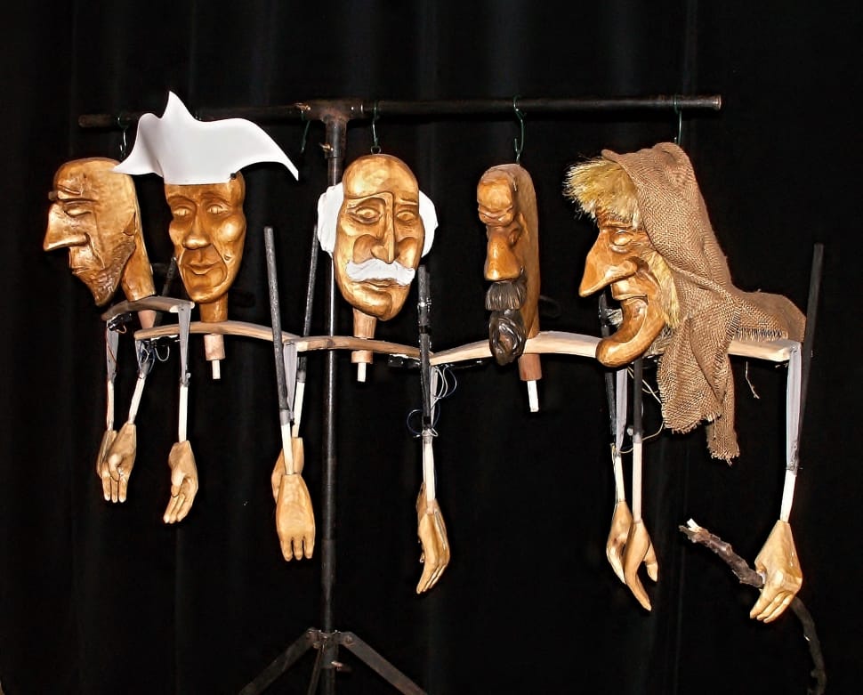 five wooden head puppets preview