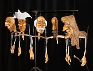 five wooden head puppets thumbnail