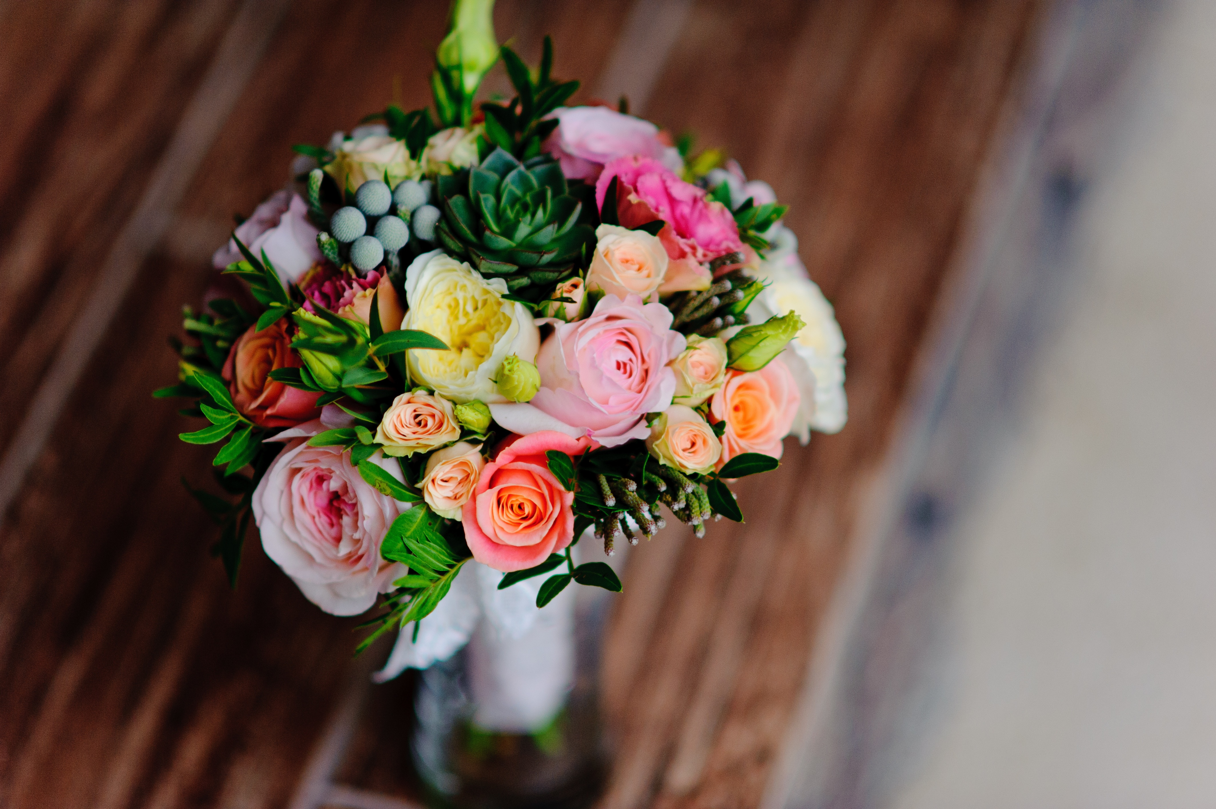 shallow focus photo of  yellow,pink,orange, and green flower  bouquet