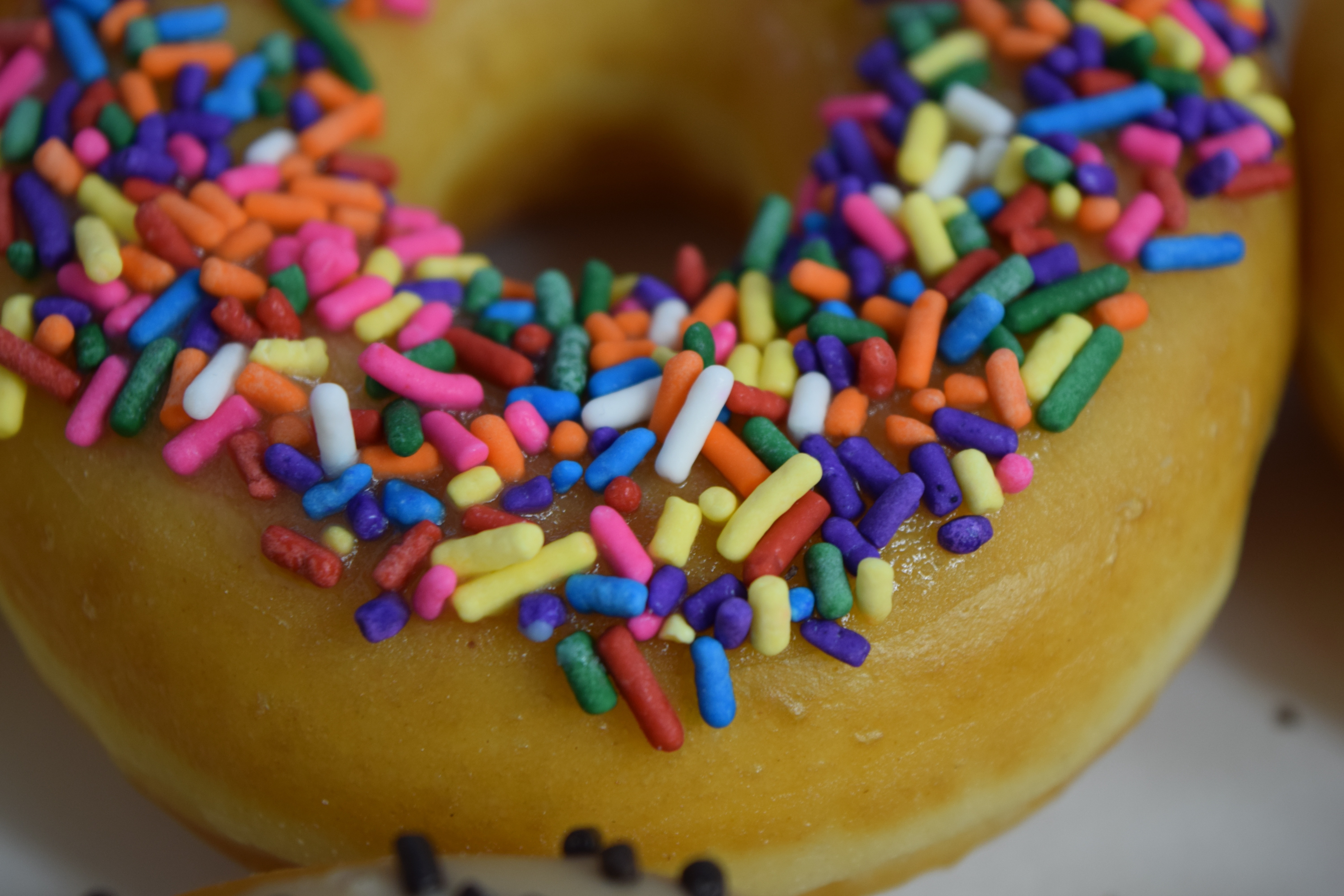 beige colorful toppings donut