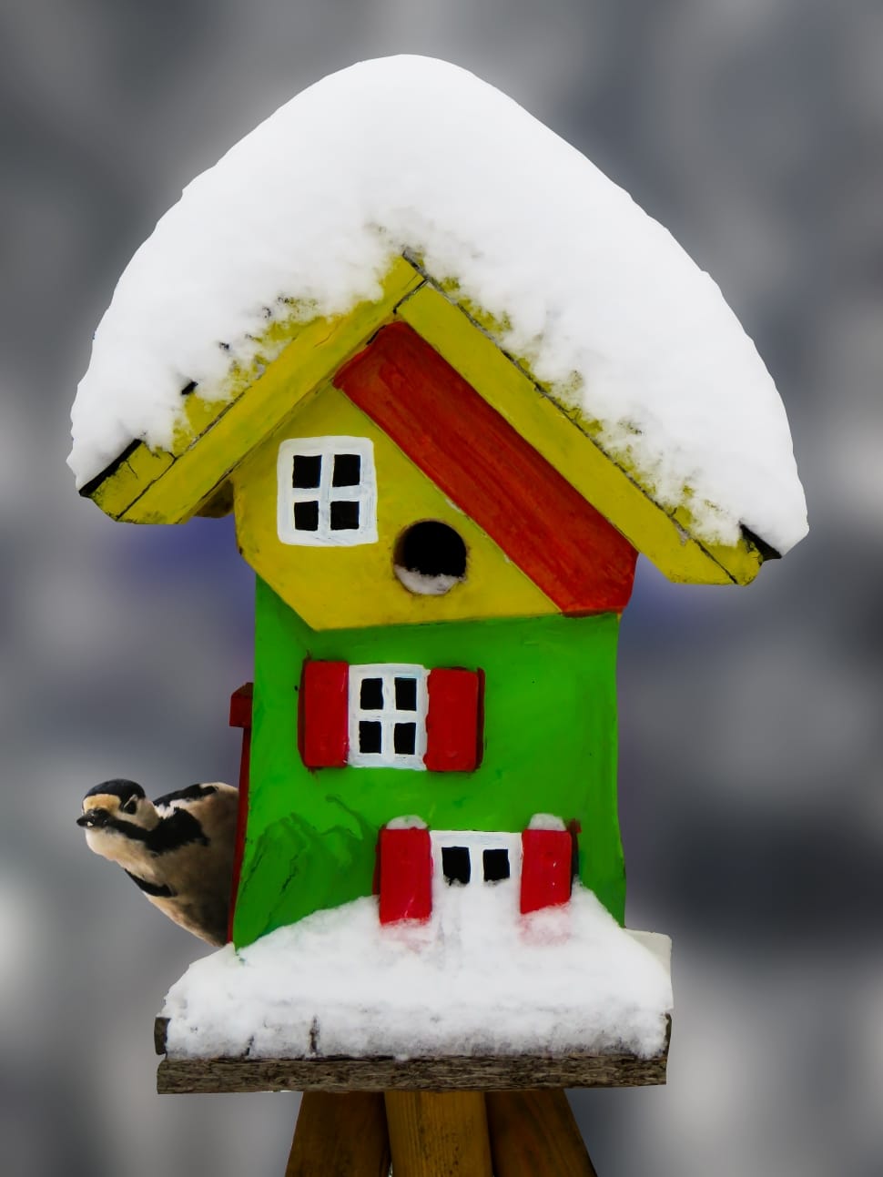 white yellow and green wooden house toy preview