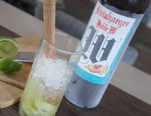 clear drinking glass and steinhenger bottle\ thumbnail