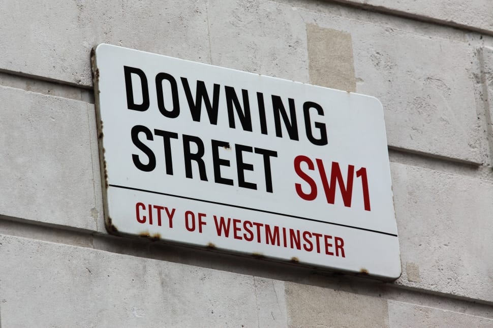 Downing Street SW1 signage on white concrete wall preview