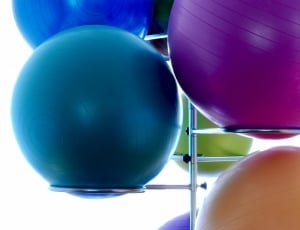 blue,green,purple,cyan and orange stability balls thumbnail