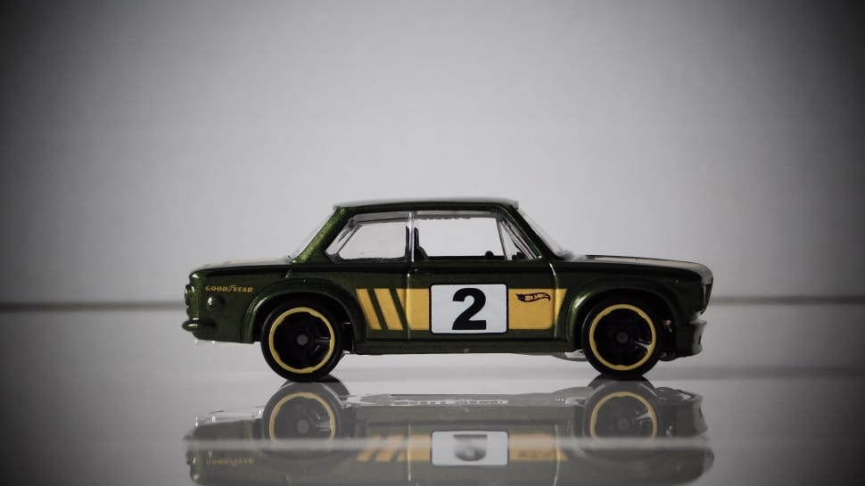 black yellow and white 2 toy sedan preview