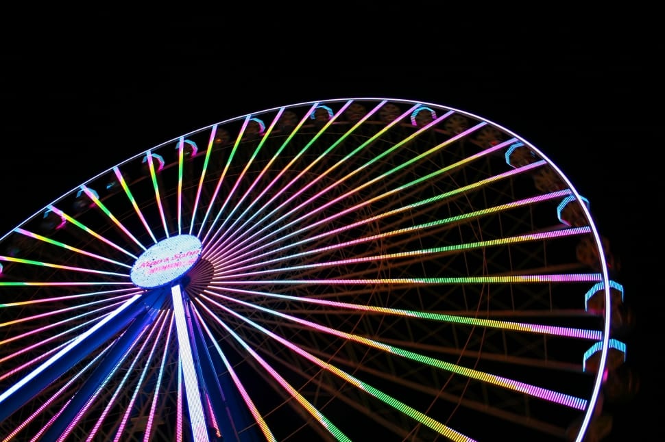 white pink and blue lighted suspension ferris wheel preview