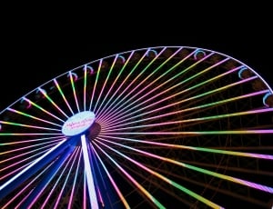 white pink and blue lighted suspension ferris wheel thumbnail