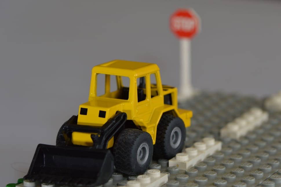 green plastic skid steer toy preview