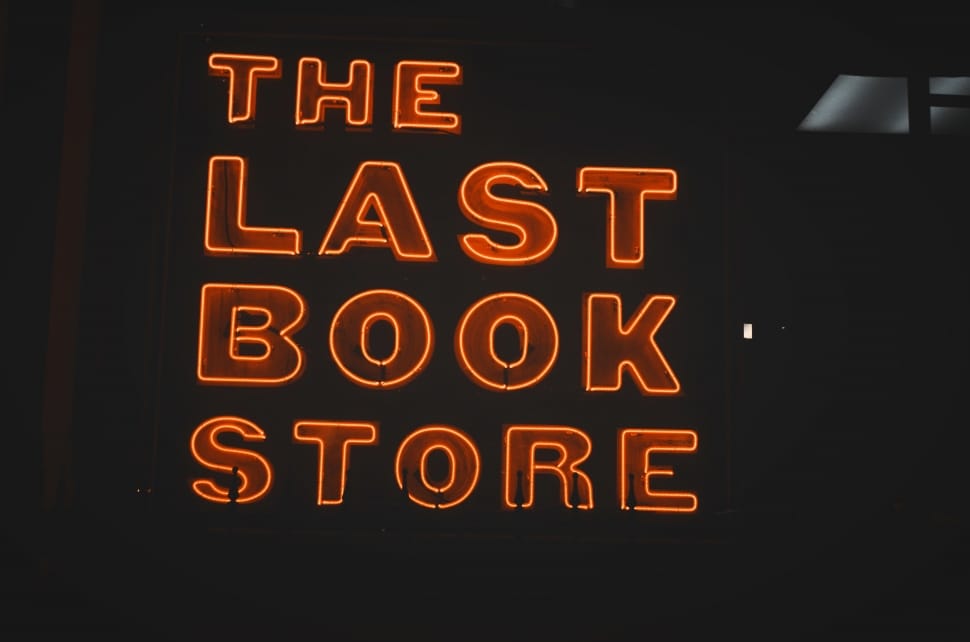 photo of red and orange the last book store led signage at black room preview