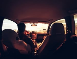 inside vehicle view of man driving thumbnail