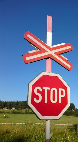 red and white stop signboard thumbnail