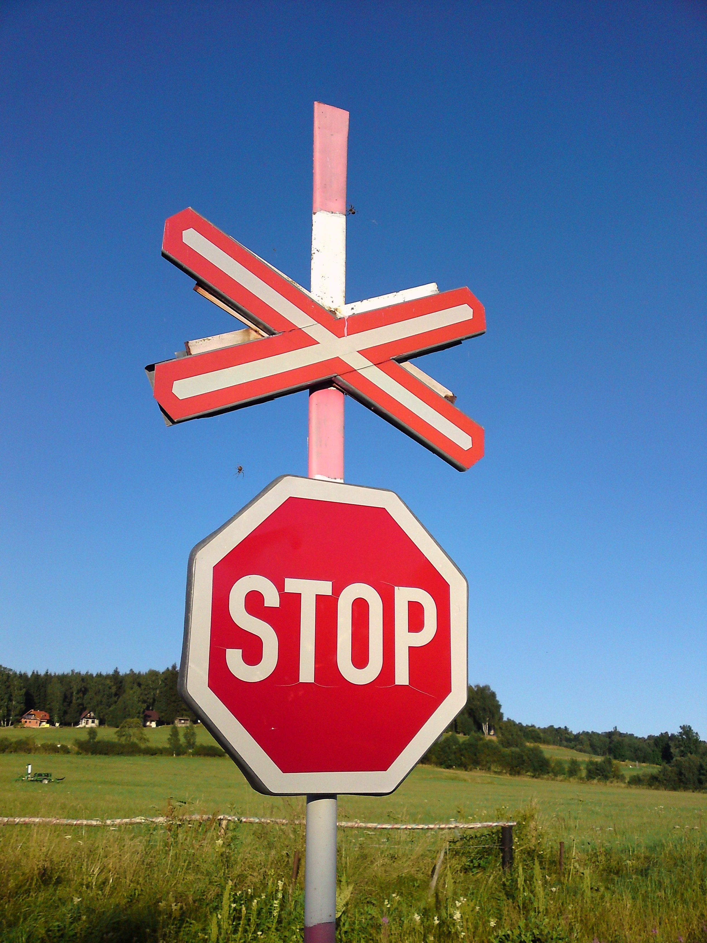 red and white stop signboard