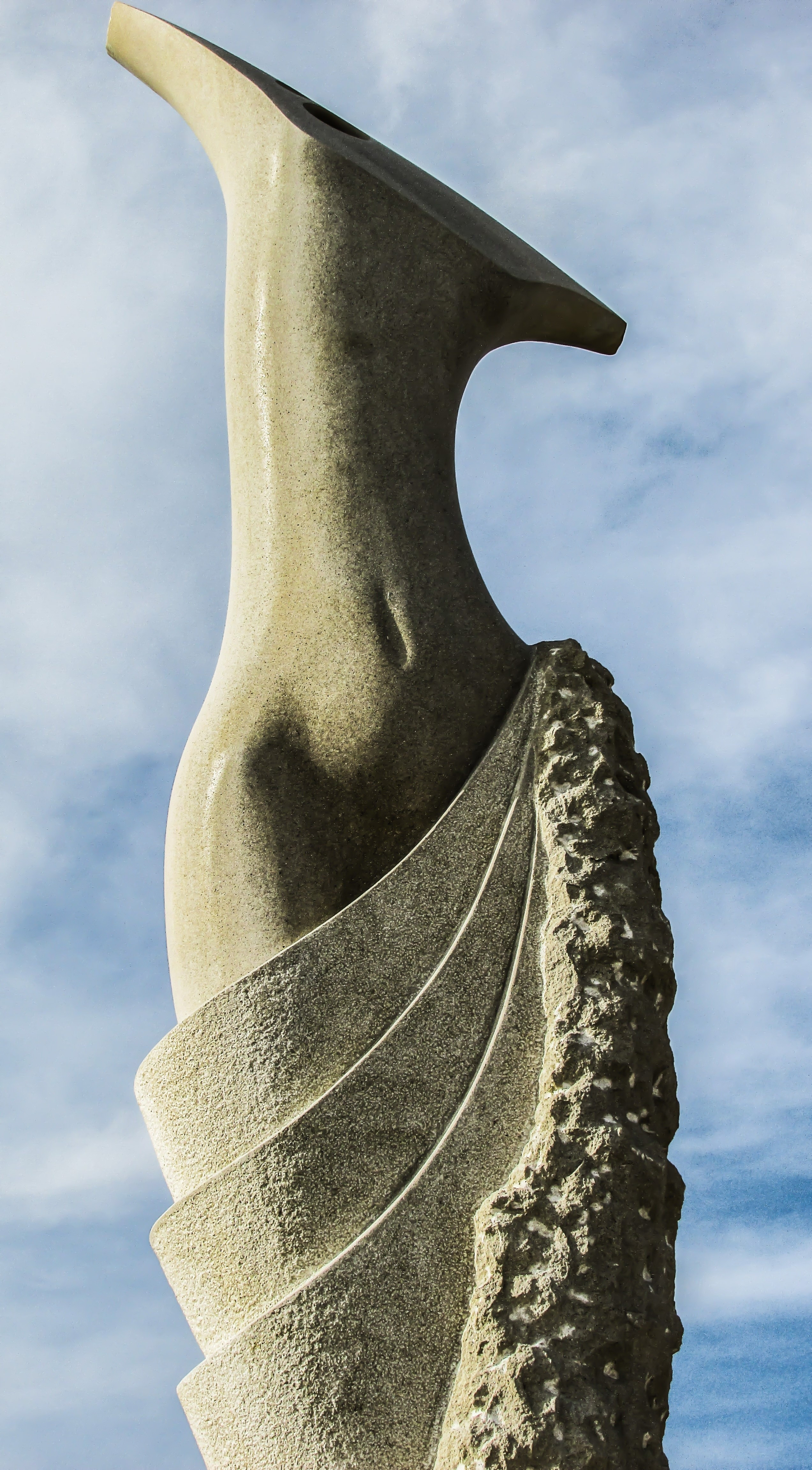 gray concrete woman bottom half body statue