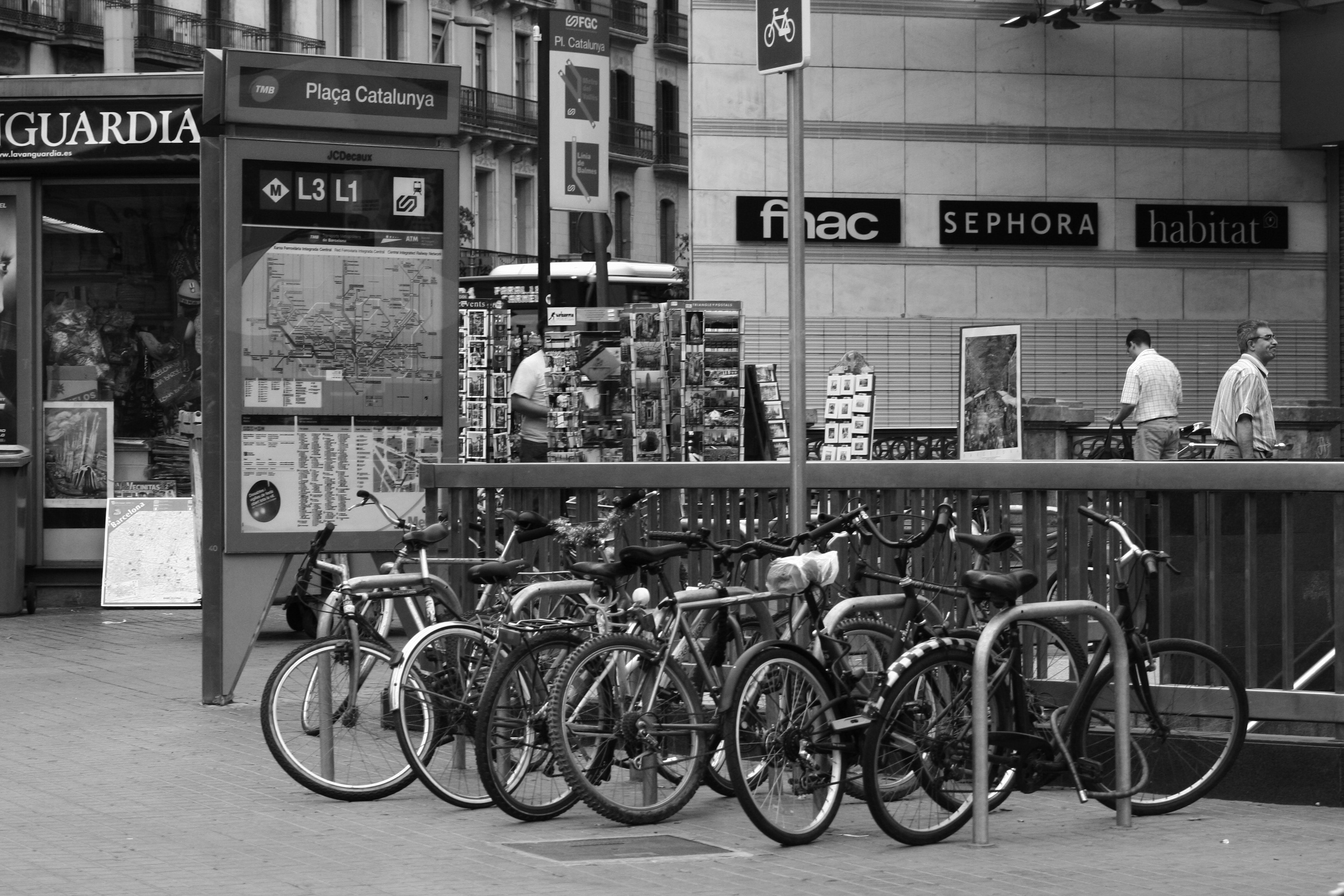grayscale of bicycle lot