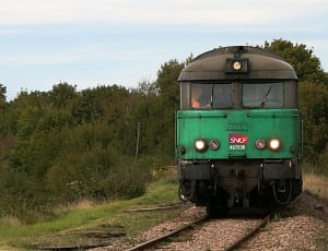green and black locomotive thumbnail