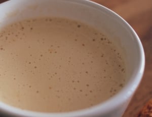 white ceramic mug filled with brown substance thumbnail