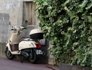 beige and brown automatic motor scooter thumbnail
