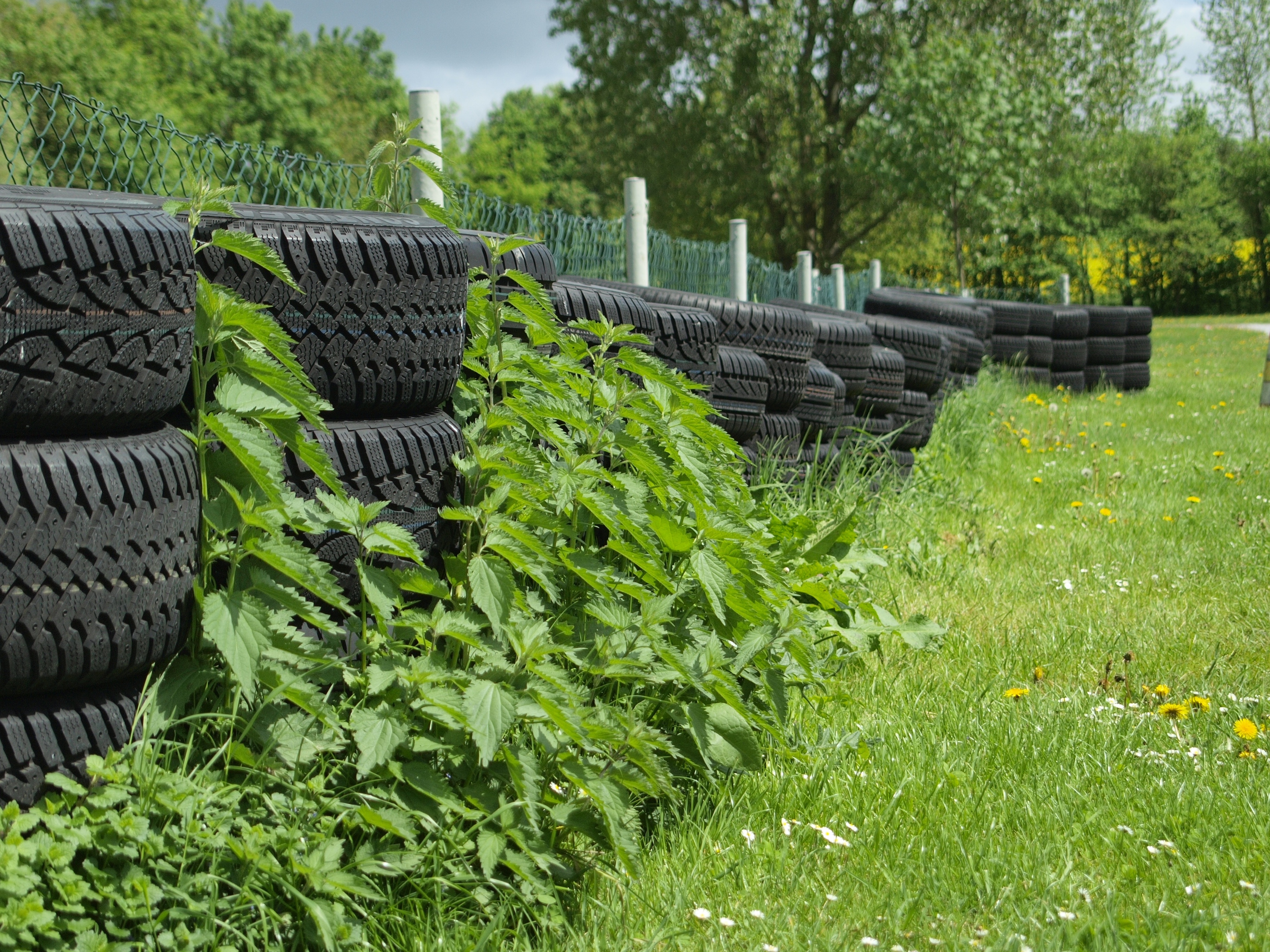 rubber tire lot on green yard