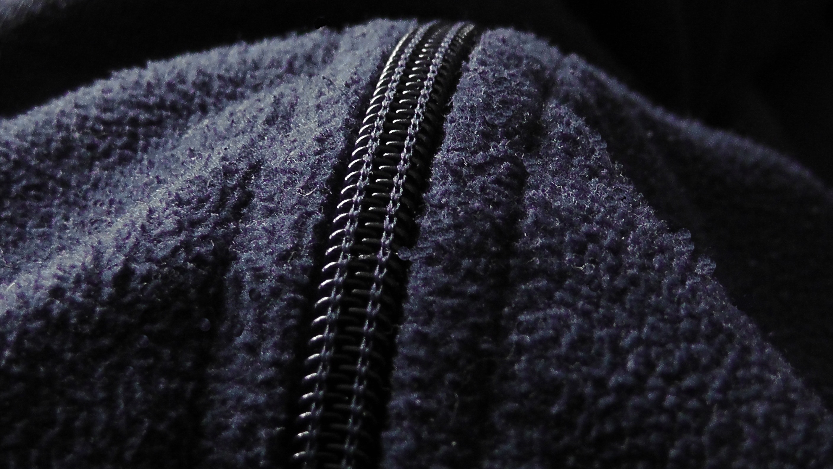 purple zipped textile