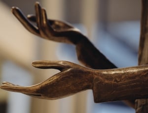 close up photo of brass statue thumbnail