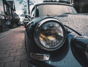 black classic car during daytime thumbnail