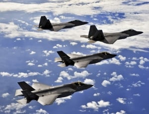 four gray fighter jets flight thumbnail