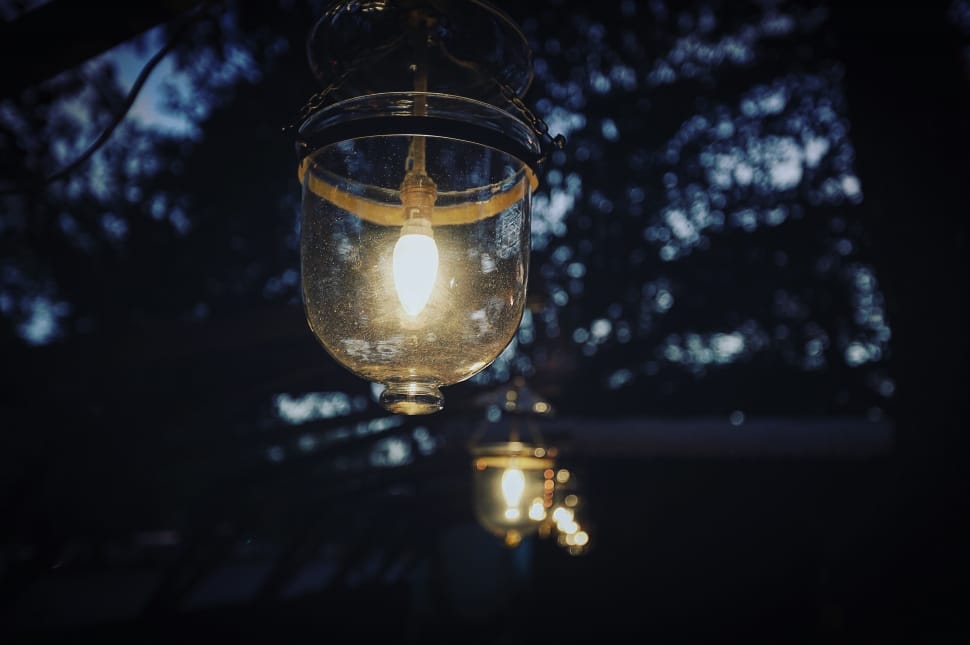 clear glass light bulb during night time preview