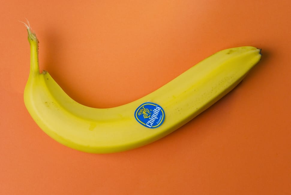 yellow banana on orange surface preview