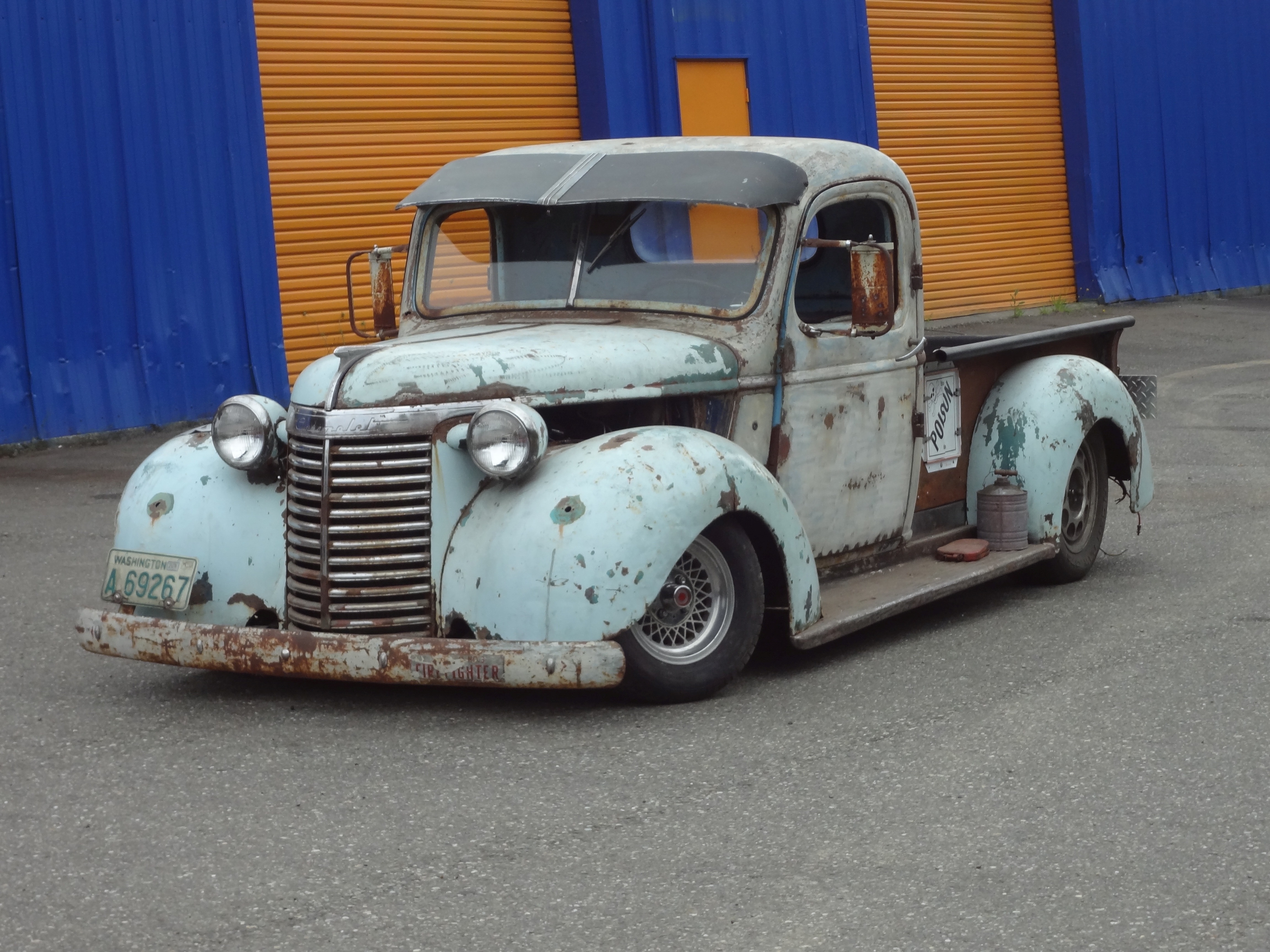teal and gray classic single cab pickup truck