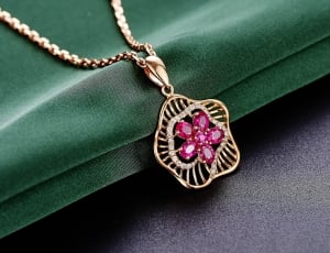 gold and pink pendant necklace thumbnail