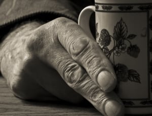 grayscale photo of floral mug thumbnail