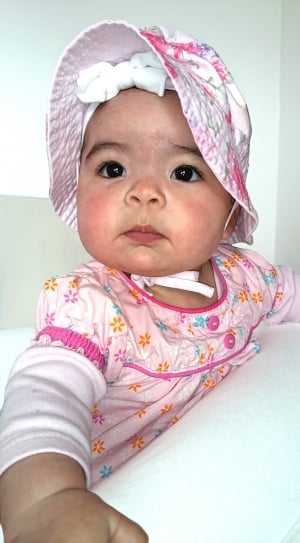 baby's pink hat thumbnail