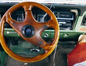 brown wooden car steering wheel thumbnail