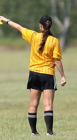 yellow and black pinstripe shirt and black and white shorts soccer uniform thumbnail