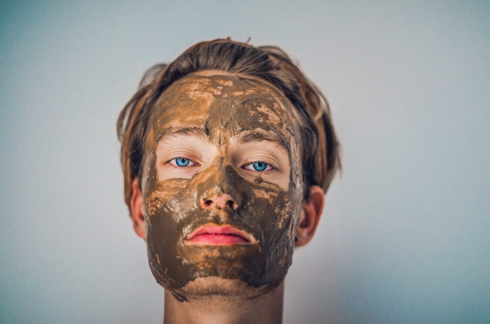 man with mud face mask preview