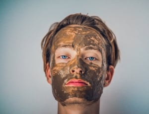 man with mud face mask thumbnail
