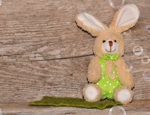beige rabbit plush toy thumbnail