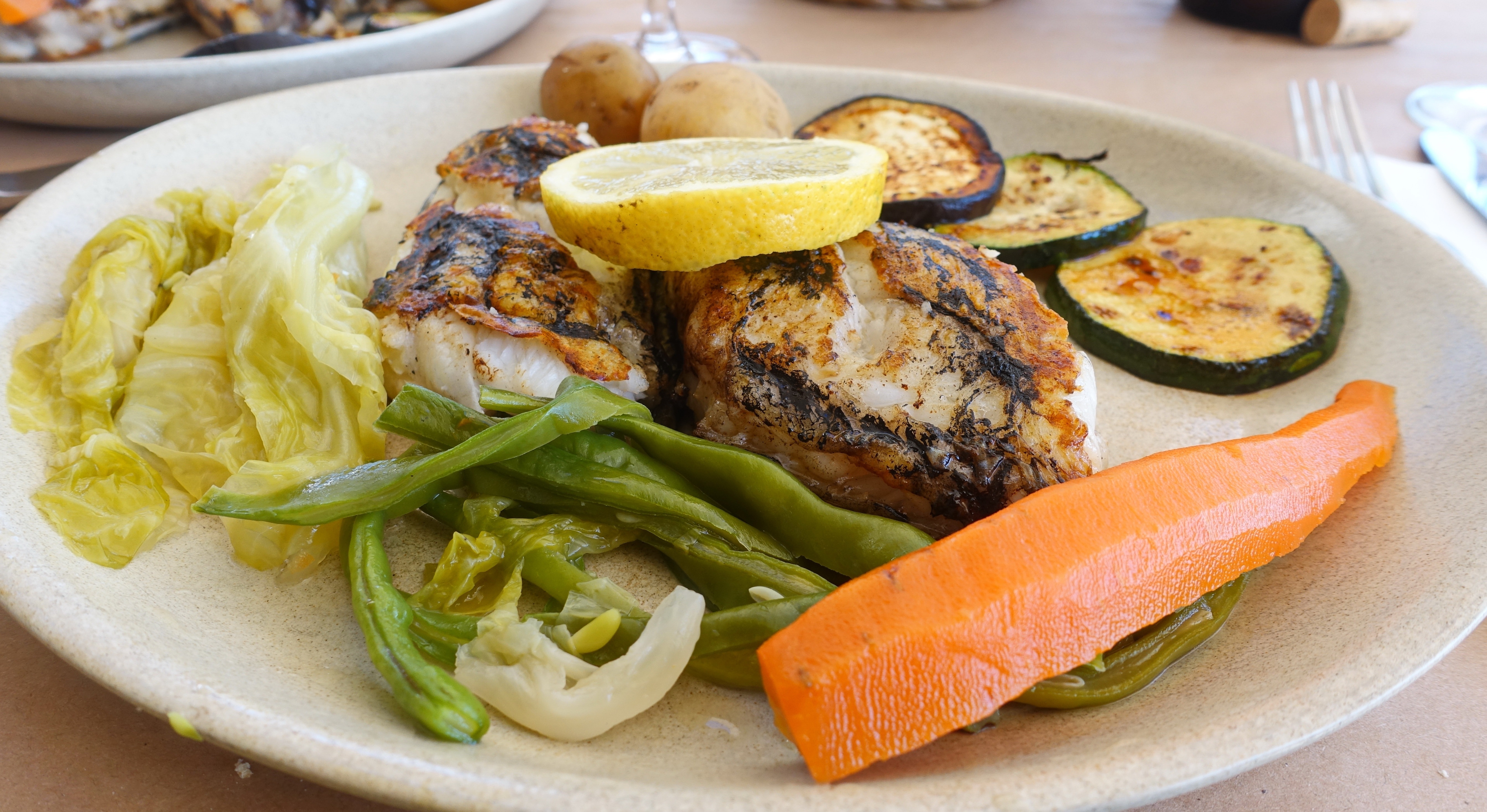 grilled fish and vegetable sides