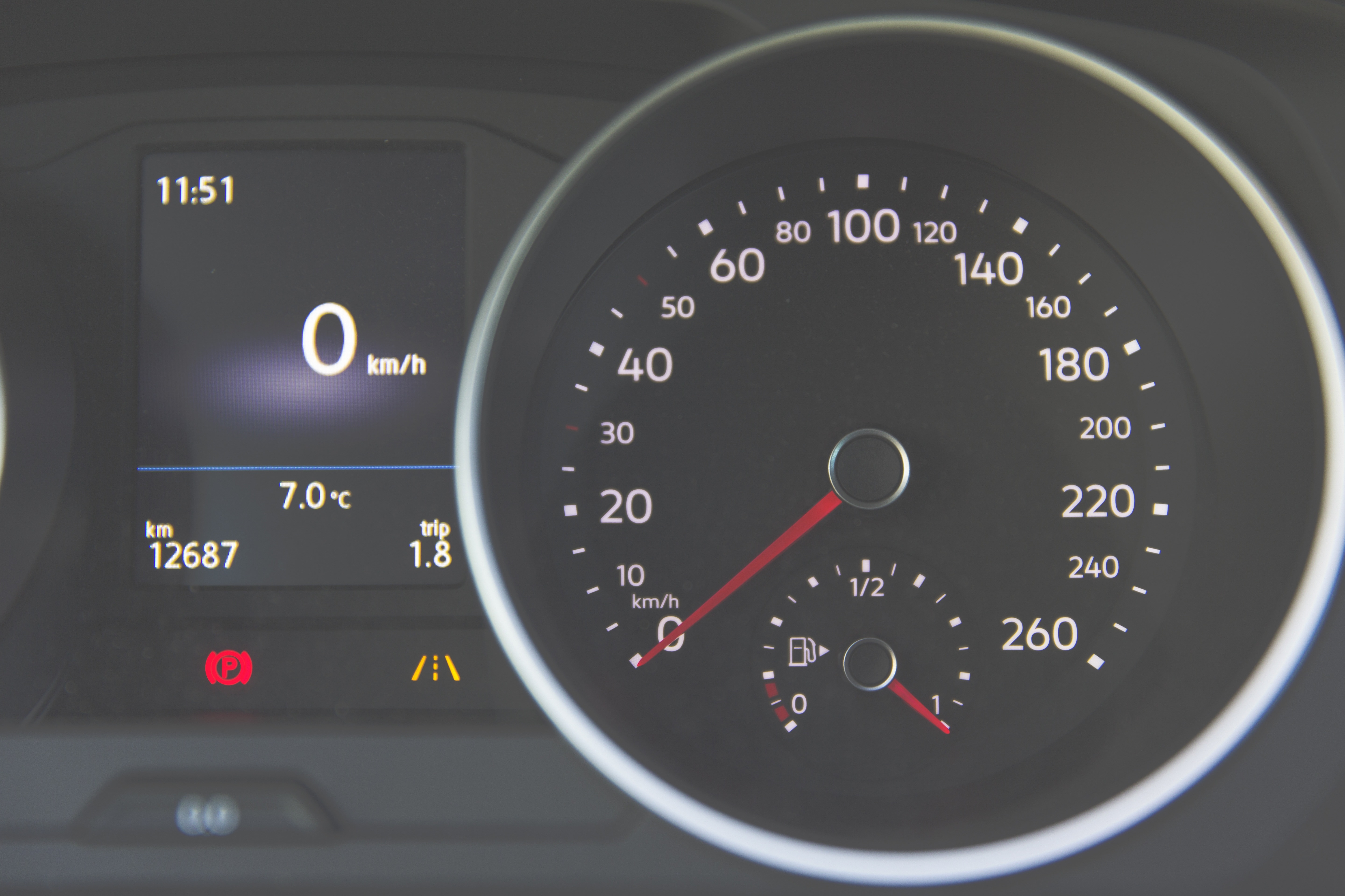 black car speedometer