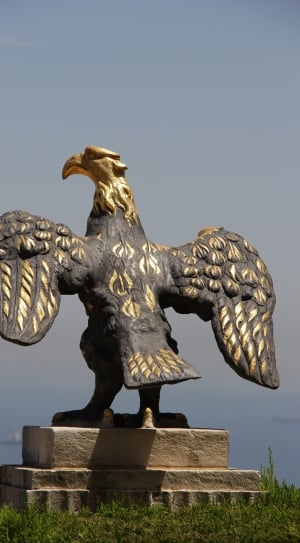 brass black bird statue thumbnail