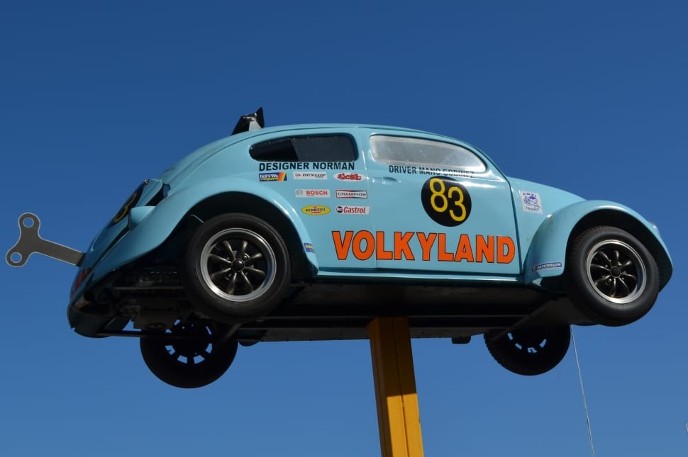 blue volkyland volkswagen beetle signage preview