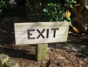 gray wooden engraved exit signage thumbnail