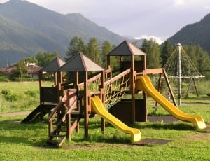 brown yellow and beige playground slide at daytime thumbnail