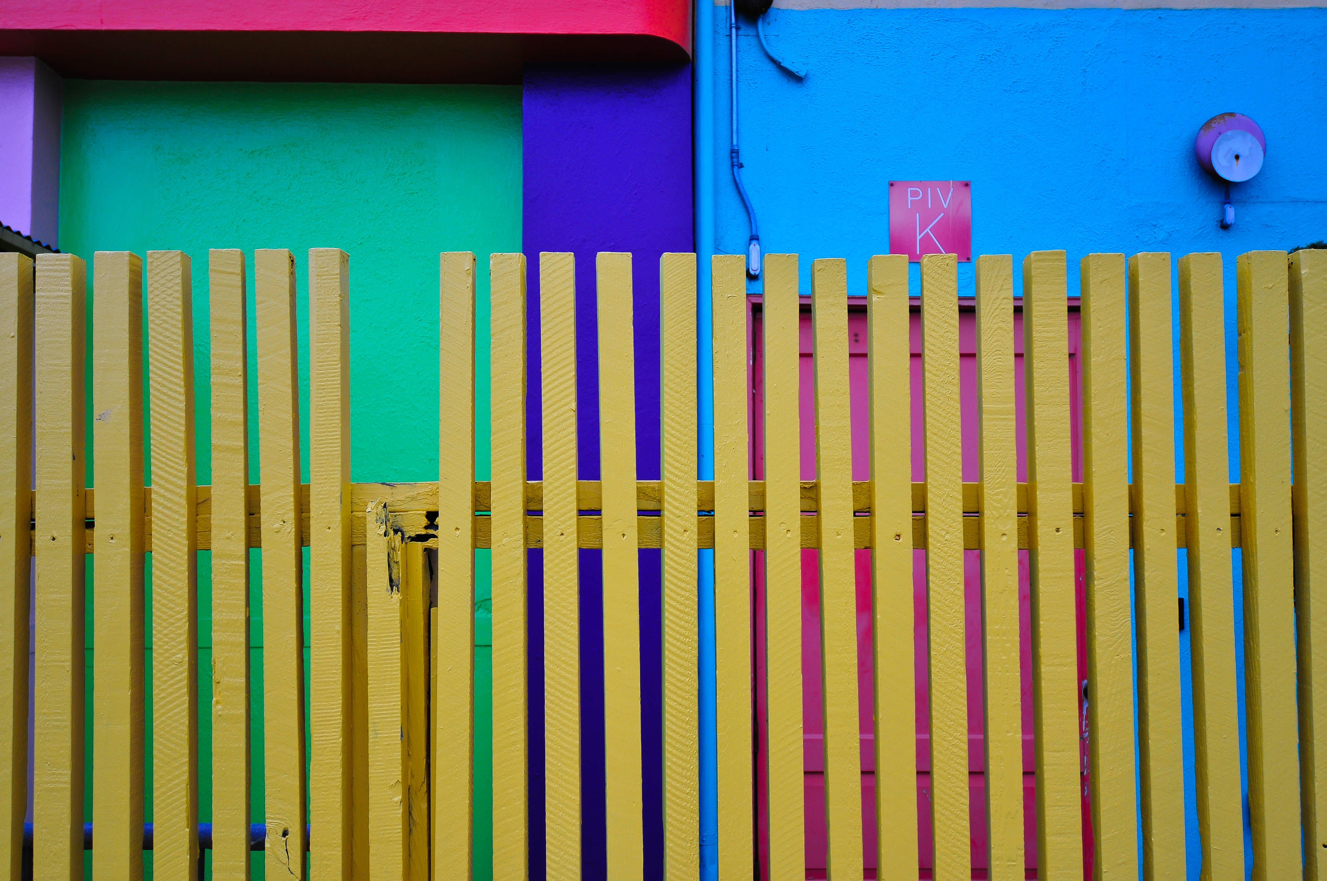 yellow wooden fence