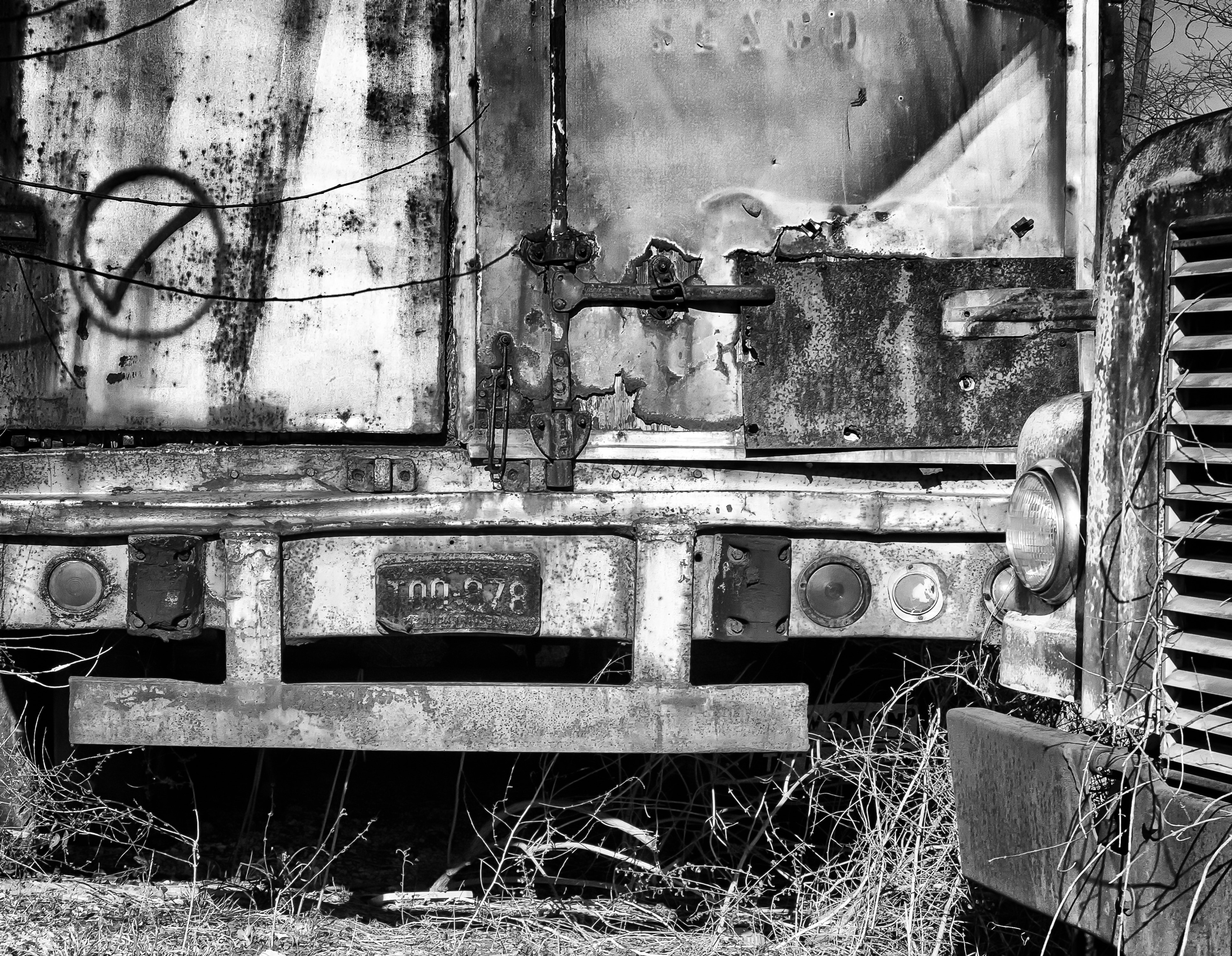 gray scale photo of utility trailer