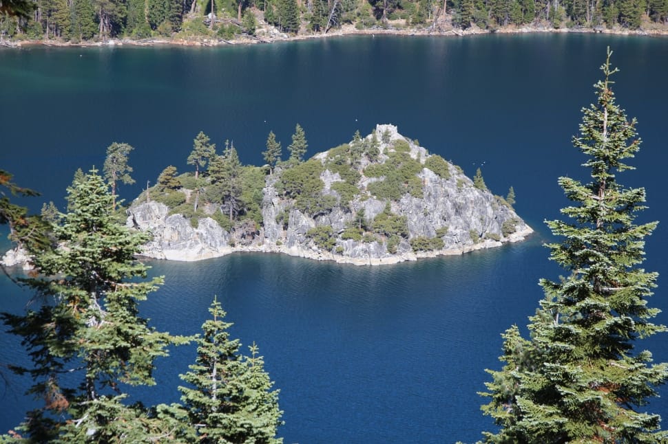 photo of an island in the middle of an lake preview