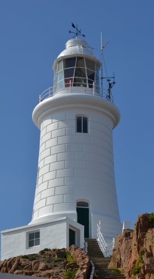 white lighthouse with wind vane thumbnail