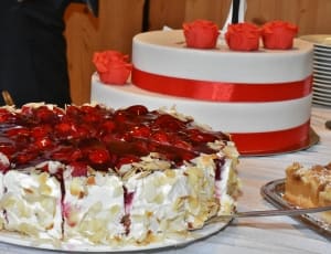 white and red single layer cake thumbnail