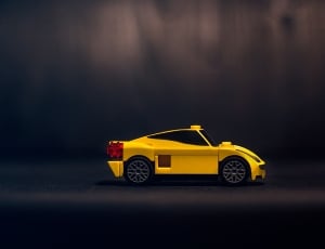 yellow racing coupe thumbnail