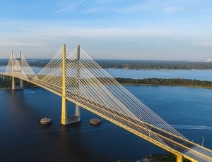 beige concrete suspension bridge at daytime thumbnail